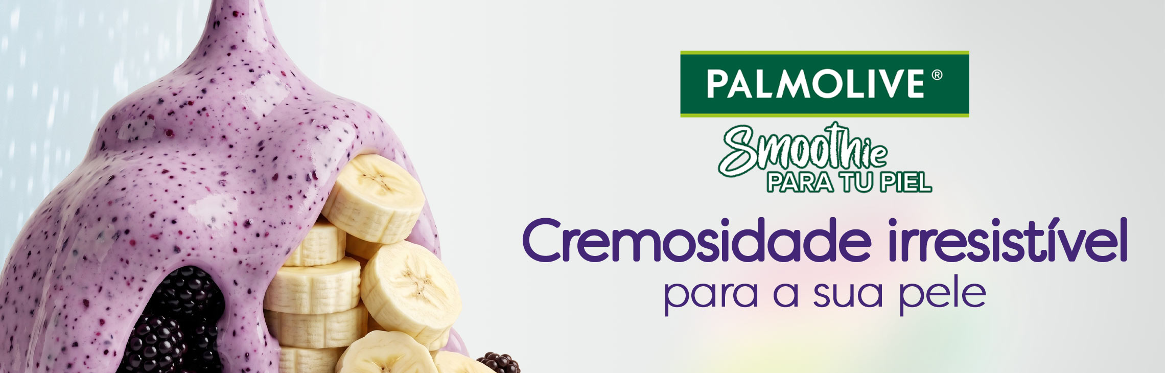 Textura cremosa do sabonete Palmolive Smoothie de frutas vermelhas e banana. Frase: Cremosidade irresistível para a sua pele.