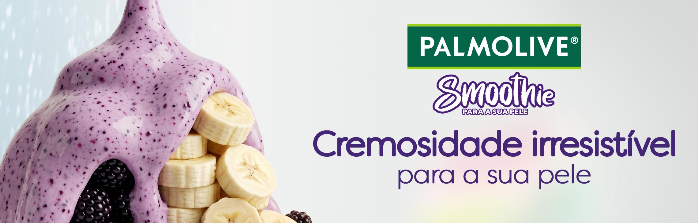 Textura cremosa do sabonete Palmolive Smoothie de frutas vermelhas e banana. Frase: Cremosidade irresistível para a sua pele.
